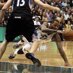Mo Williams of the Utah Jazz is fouled by Minnesota during NBA basketball in Salt Lake City Friday, April 12, 2013.