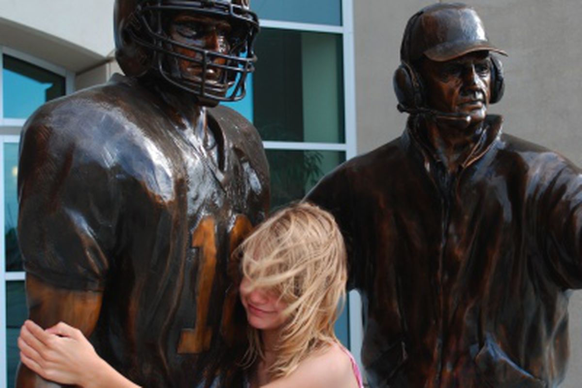 Brook Berringer and Tom Osborne immortalized in bronze. An untimely death leaves Berringer forever young in the eyes of Husker fans, especially  those too young to remember him. 