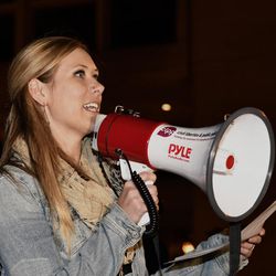Protest organizer Mallie Feltner speaks to the crowd gathered in opposition of Donald Trump's presidential election victory, Thursday, Nov. 10, 2016 At Jefferson Square Park in Louisville Ky. 