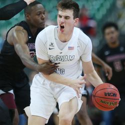 Brigham Young Cougars guard Zac Seljaas (2) is fouled by Santa Clara Broncos guard Jared Brownridge (23) during the WCC tournament in Las Vegas Saturday, March 5, 2016. BYU won 72-60. 