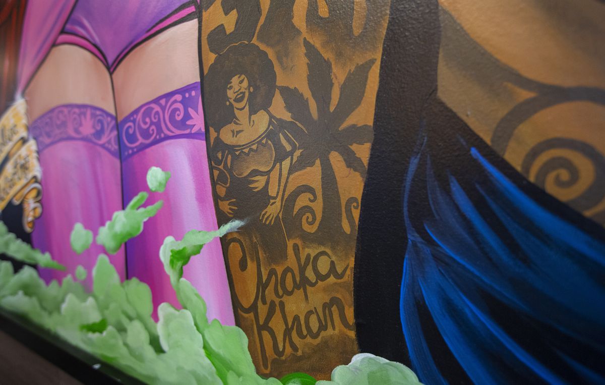 A close-up of a piece of the mural with a small portrait of Chaka Khan.