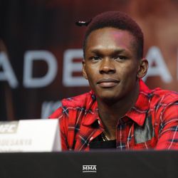 Israel Adesanya gets ready for UFC 234 press conference.
