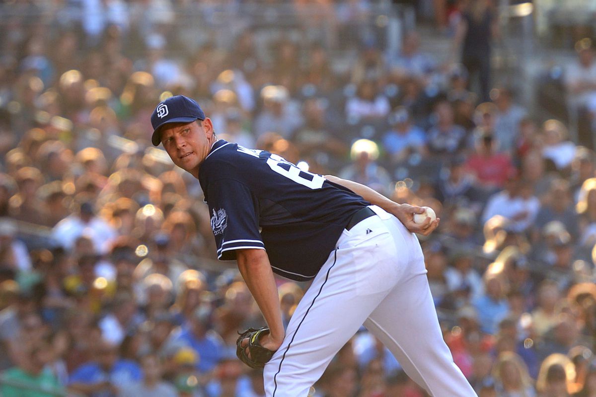 July 21, 2012; San Diego, CA, USA; San Diego Padres starting pitcher Kip Wells (60) checks first during the fourth inning against the Colorado Rockies at PETCO Park. Mandatory Credit: Jake Roth-US PRESSWIRE
