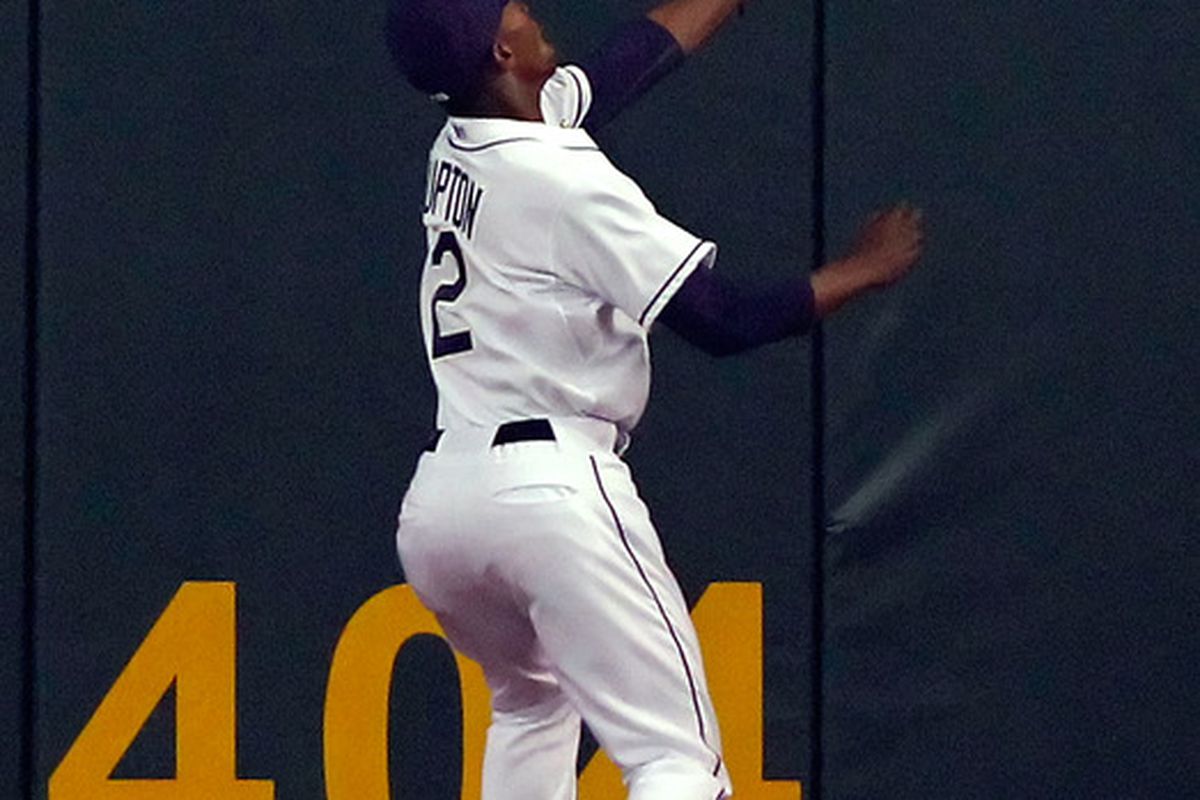 B.J. Upton #2 of the Tampa Bay Rays catches a fly ball against the Baltimore Orioles during the home opener game at Tropicana Field on April 6, 2010 in St. Petersburg, Florida.  (Photo by J. Meric/Getty Images)
