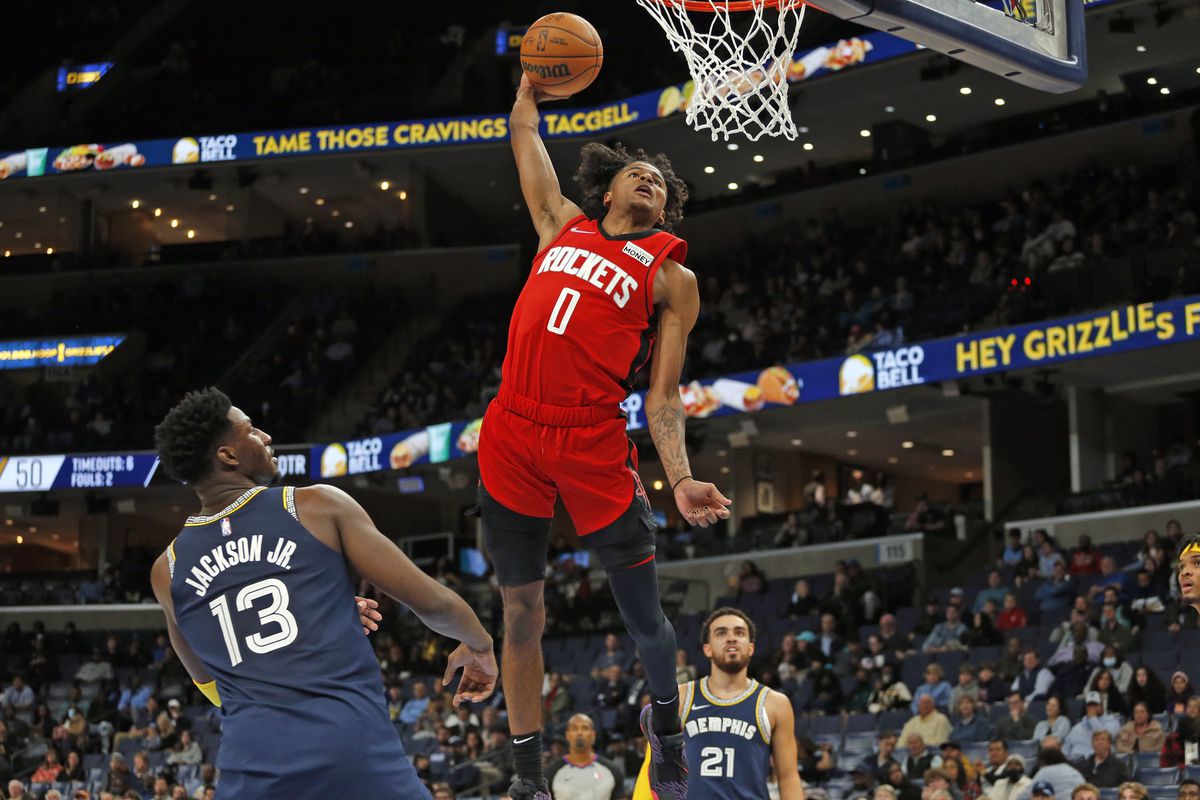 Houston Rockets guard Jalen Green (0) dunks during the first half against the Memphis Grizzles at FedExForum.