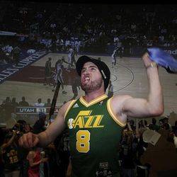 Fanatic Jazz fan Calvin Wayman cheers during tryouts for the new Jazz Rowdies club Tuesday at the Larry H. Miller Megaplex 12 at The Gateway in Salt Lake City. Winners will receive free tickets to Jazz games and sit in their own section with other Rowdies.