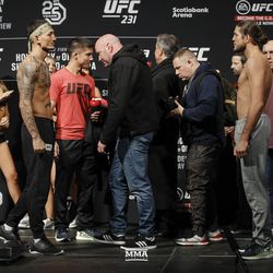 Max Holloway and Brian Ortega square off at UFC 231 weigh-ins.