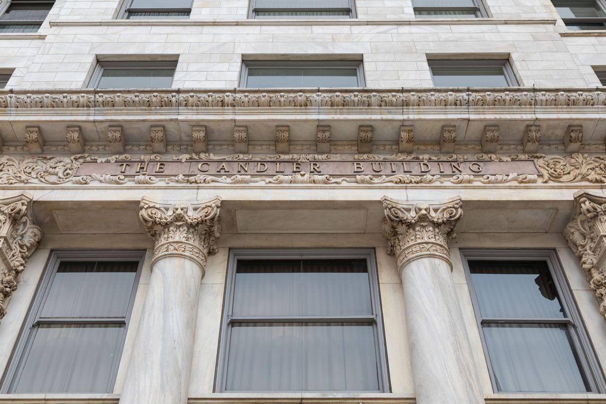 Columns on an old Atlanta hotel with The Candler Building written above. 