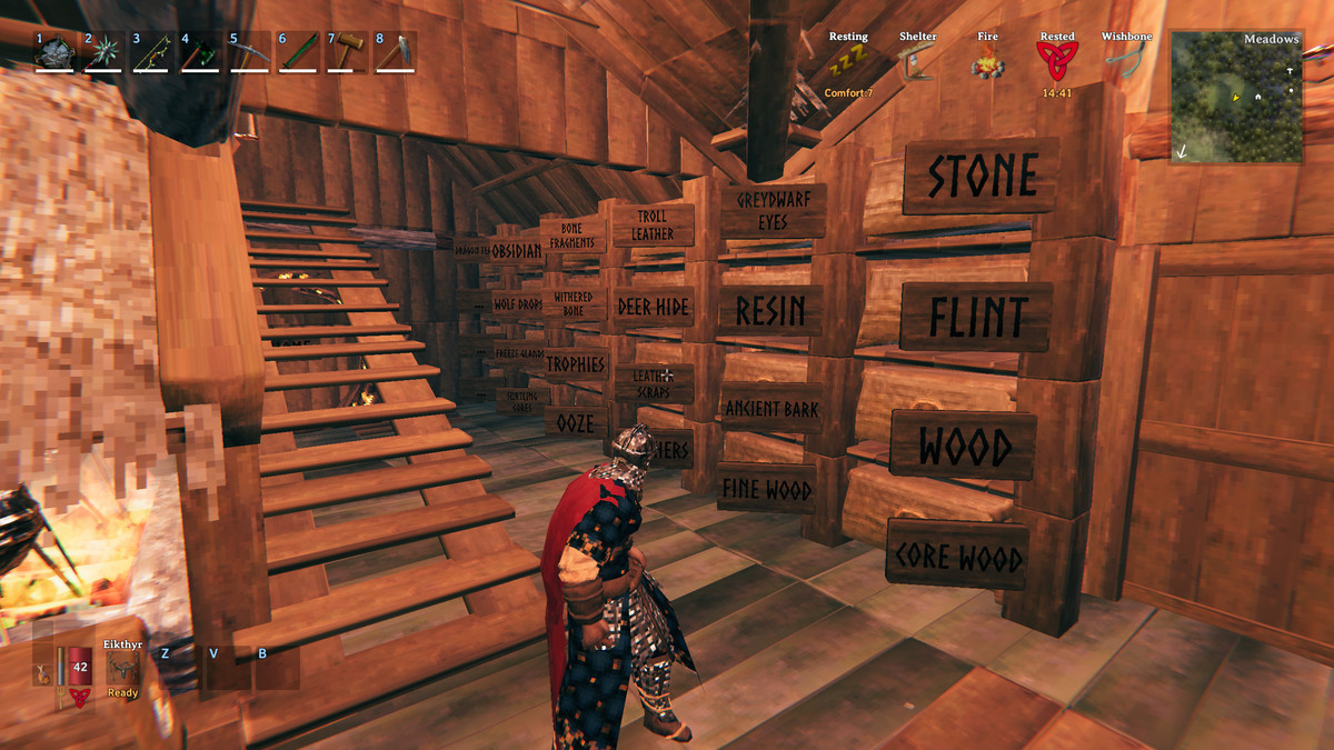 A Viking standing in a room with signs and boxes