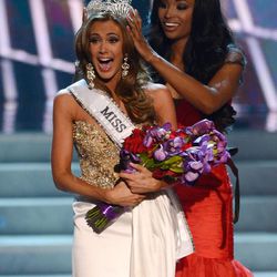 Miss Connecticut Erin Brady is crowned the winner of the Miss USA 2013 pageant by Nana Meriwether, Sunday, June 16, 2013, in Las Vegas. (AP Photo/Jeff Bottari)