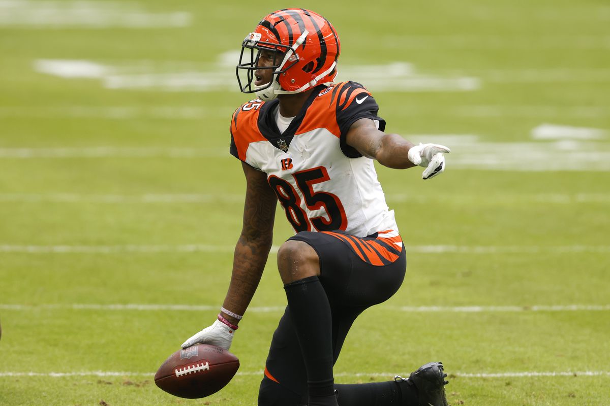 Wide receiver Tee Higgins #85 of the Cincinnati Bengals celebrates a first down reception in the first quarter of the game against the Miami Dolphins at Hard Rock Stadium on December 06, 2020 in Miami Gardens, Florida.