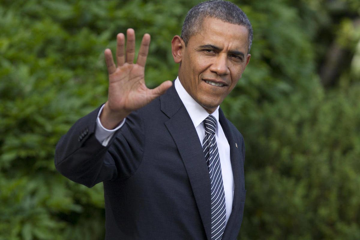 President Barack Obama waves as he walks from the White House in Washington, Friday, May 18, 2012. President Obama will be in Northern Ireland Monday and Tuesday for the G8 Summit.