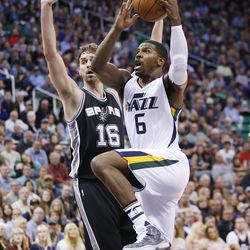 Utah Jazz forward Joe Johnson (6) drives on San Antonio Spurs center Pau Gasol (16) during NBA action in Salt Lake City on Friday, Nov. 4, 2016. The Spurs won 100-86.