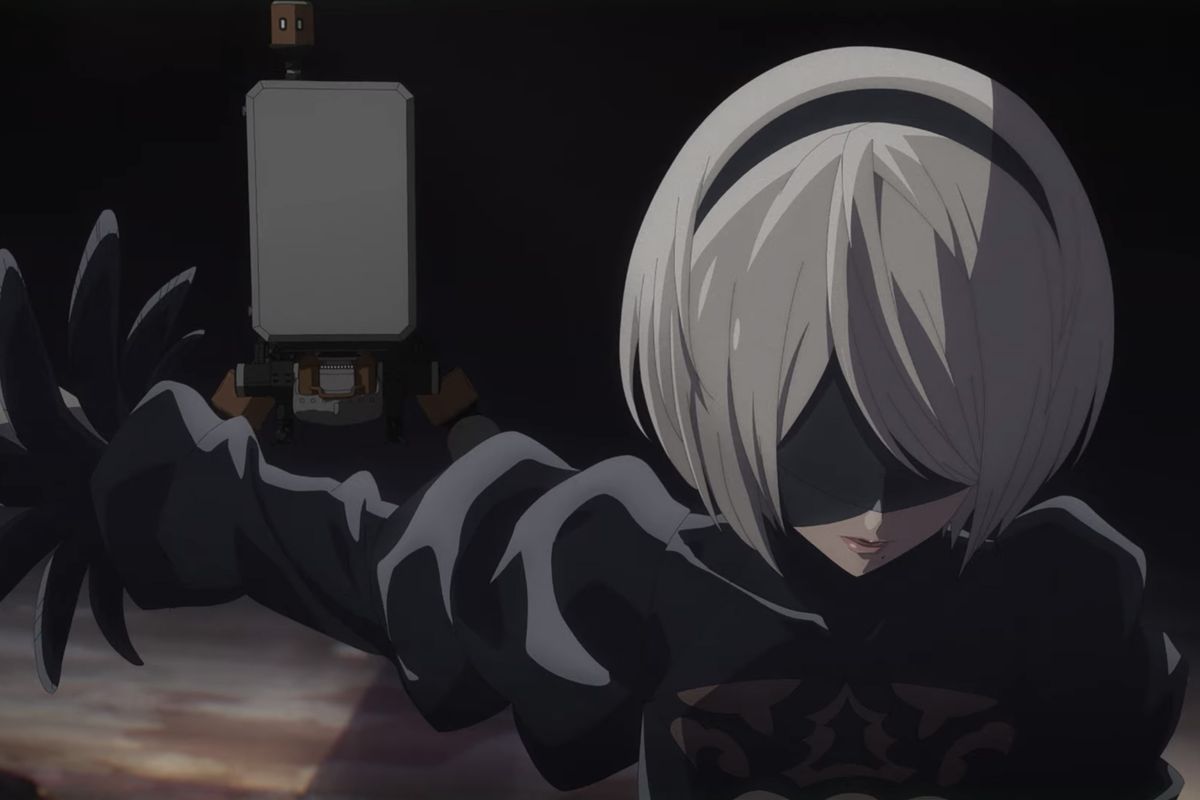 A blindfolded android girl with platinum white hair holds a katana in one hand while a box-shaped robot with arms floats behind them.