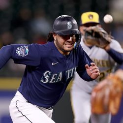 Eugenio Suarez #28 of the Seattle Mariners is caught stealing in between second base and third base during the fourth inning at T-Mobile Park on April 17, 2023 in Seattle, Washington.