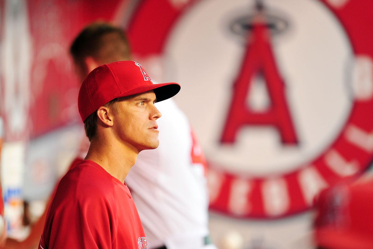 July 28, 2012; Anaheim, CA, USA; Los Angeles Angels pitcher Zack Greinke watches game action during the fourth inning against the Tampa Bay Rays at Angel Stadium. Mandatory Credit: Gary A. Vasquez-US PRESSWIRE
