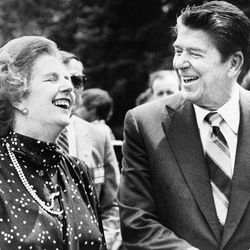 FILE - U.S. President Ronald Reagan, right, and Britain's Prime Minister Margaret Thatcher, share a laugh during a break from a session at the Ottawa Summit in this file photo dated July 21, 1981, at Government House in Ottawa, Canada.  Personal papers from 1981 released Saturday March 17, 2012, by the Thatcher archive at Cambridge University in England, reveal that Thatcher was fascinated by U.S. President Reagan, and that she snatched and kept a page of his doodles from this G7 summit in Ottawa. Reagan left the piece of paper adorned with his sketches, sitting on a table at the Ottawa meeting when Margaret Thatcher picked it up and kept it, it is revealed in her papers released Saturday. 