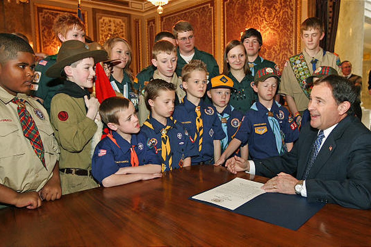 Gov. Gary Herbert signs a proclamation while commemorating the 100-year anniversary of Scouting in America in the Capitol on Thursday. Of the record-high 52,407 Eagle Scout awards earned in the United States during 2009, 5,640 of them — almost 10.8 percen