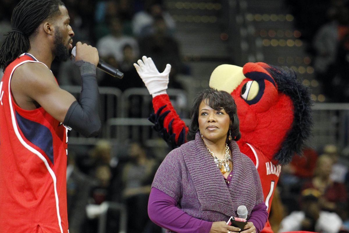 DeMarre Carroll and Dr. King's daughter, Bernice King, talk to the crowd.