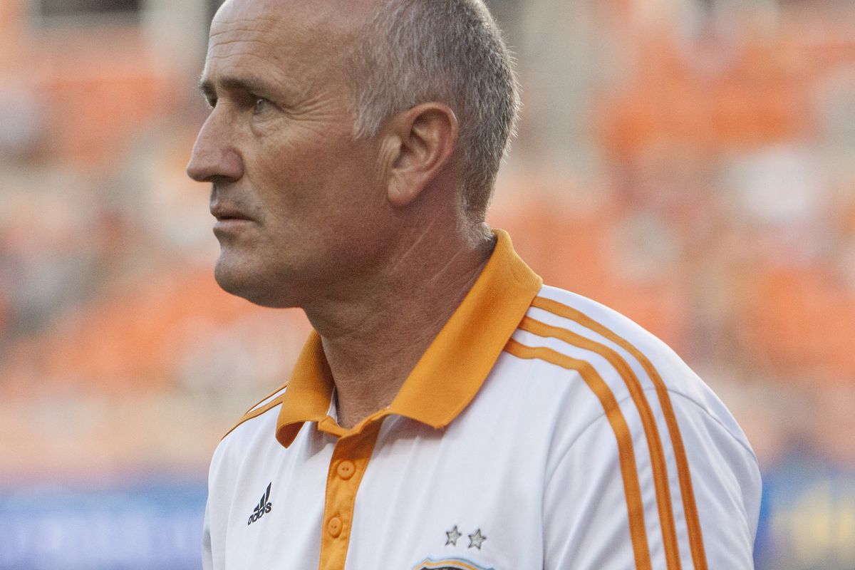 HOUSTON - JULY 21:  Head coach Dominic Kinnear of the Houston Dynamo looks on during a game against the Montreal Impact at BBVA Compass Stadium on July 21, 2012 in Houston, Texas. Houston won 3-0. (Photo by Bob Levey/Getty Images)