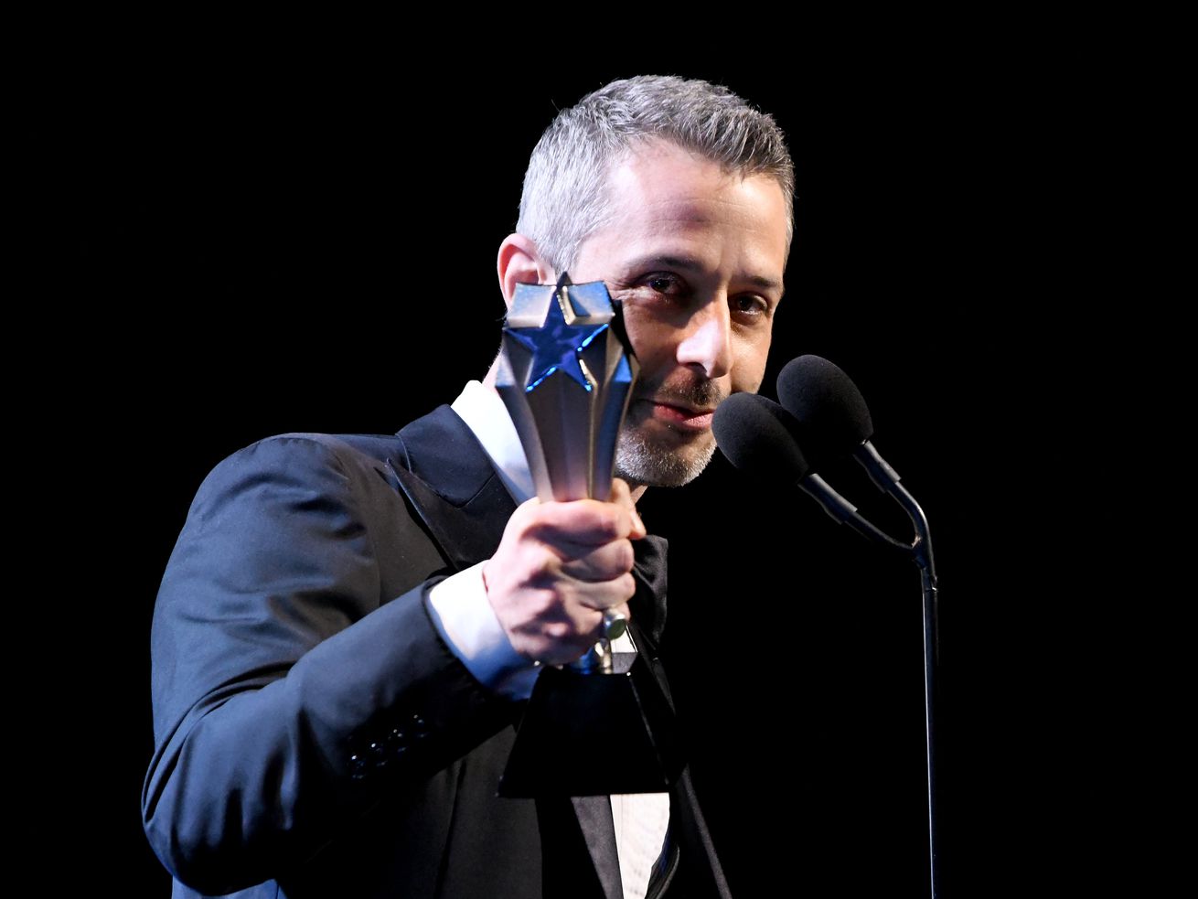 Jeremy Strong holding the award for Best Actor in a Drama Series award for “Succession” during the 25th Annual Critics’ Choice Awards on January 12, 2020, in Santa Monica, California.