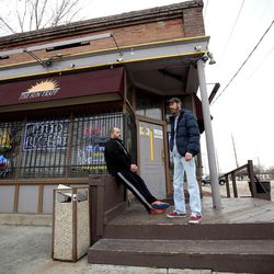 Michael Repp, door security, and Frank Chugg, owner, chat outside The Sun Trap in Salt Lake City on Tuesday, Dec. 13, 2016. The Sun Trap is located on the same block as the site for one of four new homeless resource centers, 648 W. 100 South.