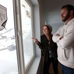 Gentry and Ryan Holbrook walk through the house they are having built in North Salt Lake on Tuesday, Dec. 29, 2015. 