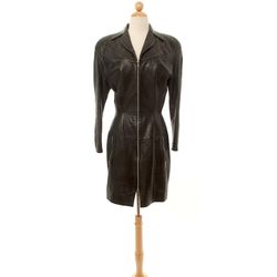 Vintage Mugler Leather Zip Dress from the ‘80s, <a href="http://www.shopdecadesinc.com/shop/viewproduct/5208" target="_blank">$1,200</a>. "Take the leather trend and ramp it up with this sexy piece. I could see Grace Jones rocking it."
