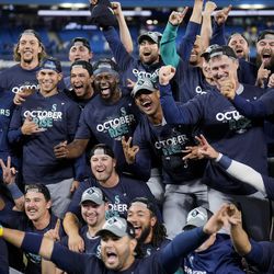 The Seattle Mariners celebrate after defeating the Toronto Blue Jays in game two to win the American League Wild Card Series at Rogers Centre on October 08, 2022