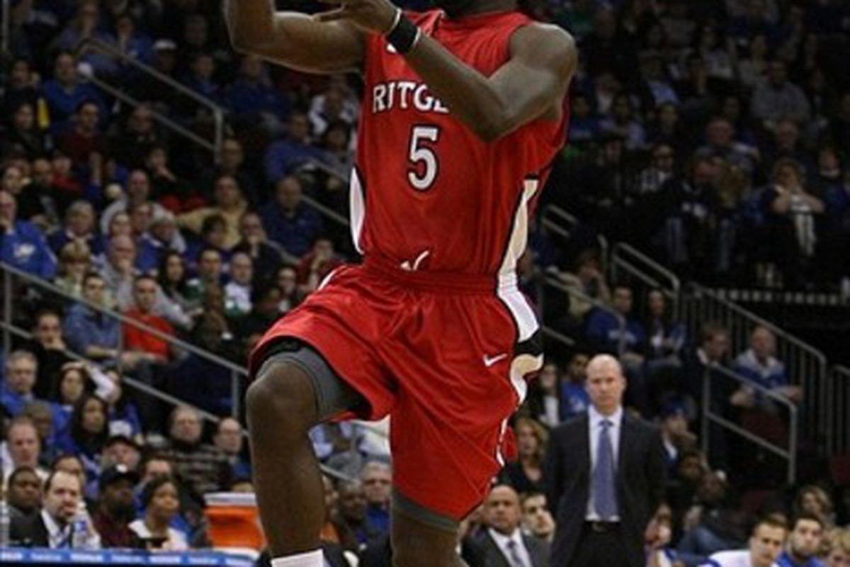 Feb 25 2012; Newark, NJ, USA; Rutgers Scarlet Knights guard Eli Carter (5) passes the ball against the Seton Hall Pirates during the second half at the Prudential Center.  Mandatory Credit: Alan Maglaque-US PRESSWIRE