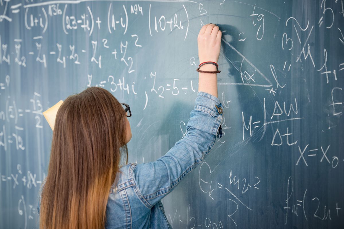 Math chalkboard woman
