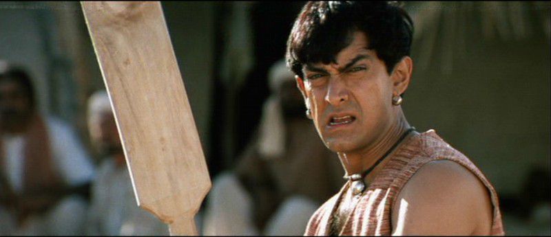 Aamir Khan holds a cricket bat in Lagaan.
