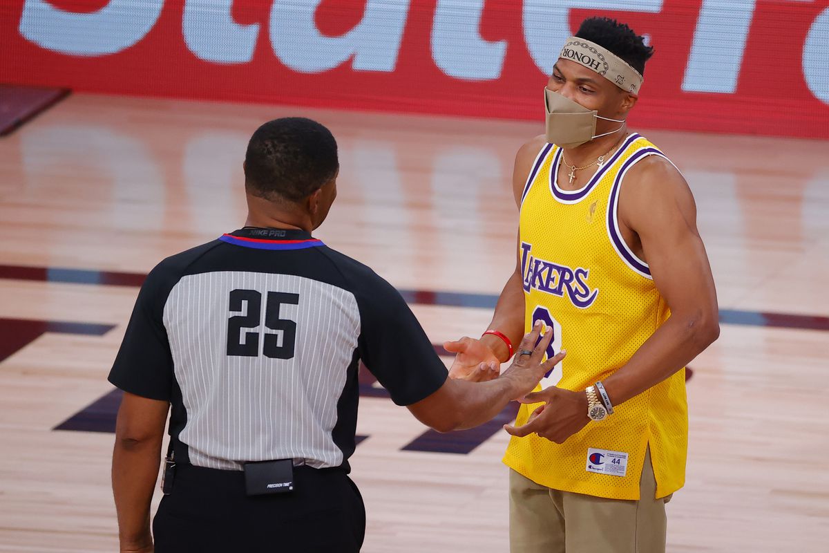 Russell Westbrook of the Houston Rockets talks with referee Tony Brothers during the second quarter against the Oklahoma City Thunder in Game Four of the Western Conference First Round during the 2020 NBA Playoffs at AdventHealth Arena at ESPN Wide World Of Sports Complex on August 24, 2020 in Lake Buena Vista, Florida.