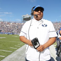 Brigham Young Cougars head coach Kalani Sitake watches his team come onto the field  in Provo on Saturday, Nov. 12, 2016. 