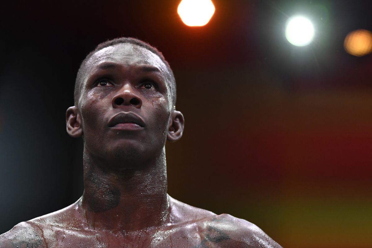 Israel Adesanya of Nigeria reacts after his UFC light heavyweight championship fight against Jan Blachowicz of Poland during the UFC 259 event at UFC APEX on March 06, 2021 in Las Vegas, Nevada.