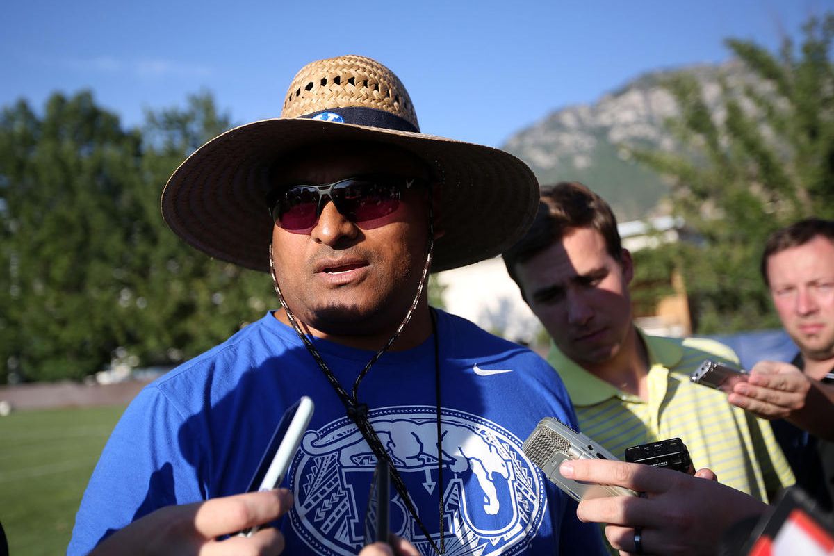 Head coach Kalani Sitake talks to the media after football practice at BYU in Provo on Monday, July 31, 2017. 