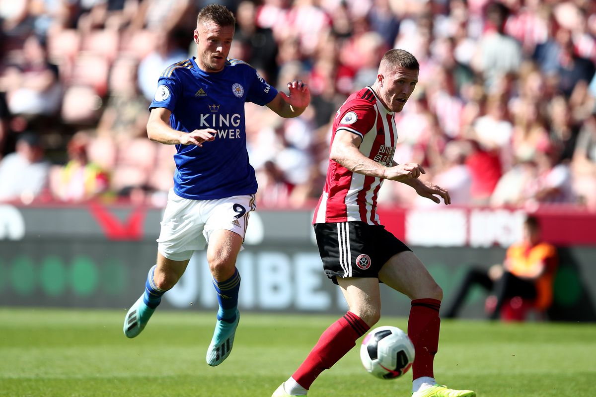 Jamie Vardy challenges John Lundstram - Sheffield United v Leicester City - Premier League