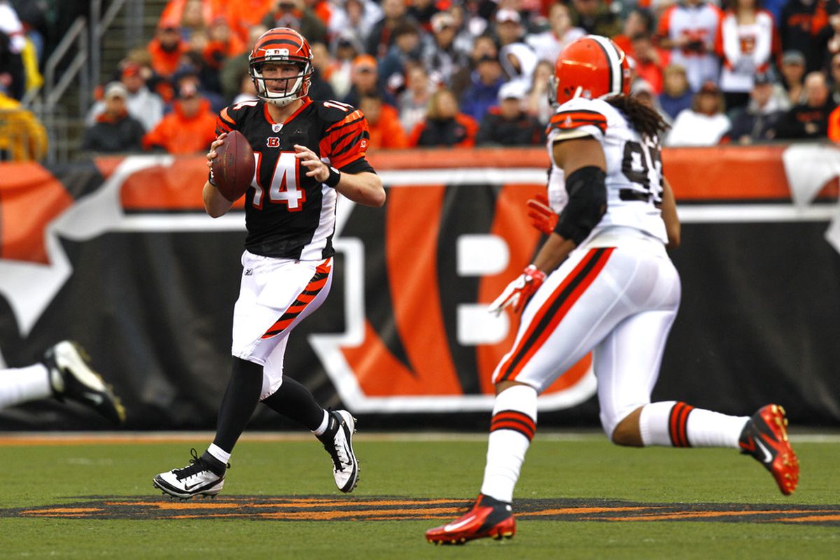 CINCINNATI, OH - NOVEMBER 27:  Andy Dalton #14 of the Cincinnati Bengals looks for an open receiver against the Cleveland Browns at Paul Brown Stadium on November 27, 2011 in Cincinnati, Ohio.  (Photo by Tyler Barrick /Getty Images)