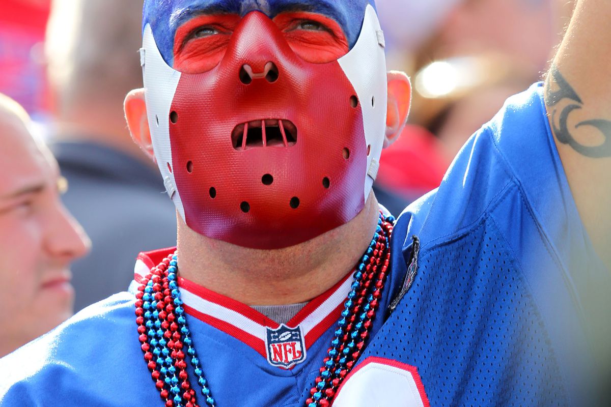 Sept. 16, 2012; Orchard Park, NY, USA;  A Buffalo Bills fan celebrates a touchdown during the second half against the Kansas City Chiefs at Ralph Wilson Stadium.  Bills beat the Chiefs 35 to 17.  Mandatory Credit: Timothy T. Ludwig-US PRESSWIRE