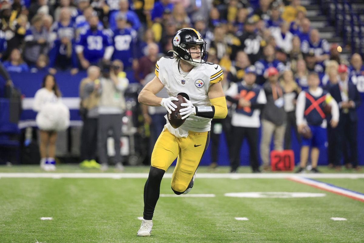 Kenny Pickett #8 of the Pittsburgh Steelers looks to pass against the Indianapolis Colts during the fourth quarter in the game at Lucas Oil Stadium on November 28, 2022 in Indianapolis, Indiana.