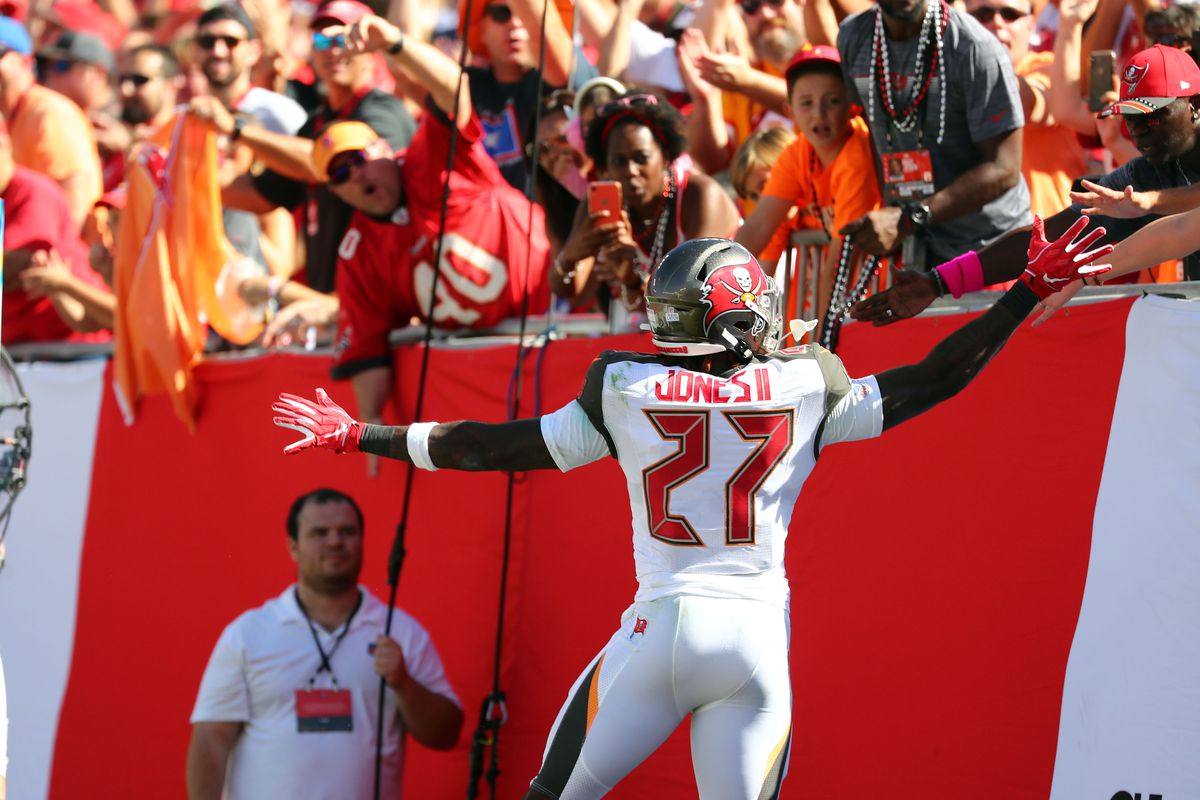 Tampa Bay Buccaneers running back Ronald Jones celebrates with fans after scoring a touchdown against the Arizona Cardinals during the first quarter at Raymond James Stadium.