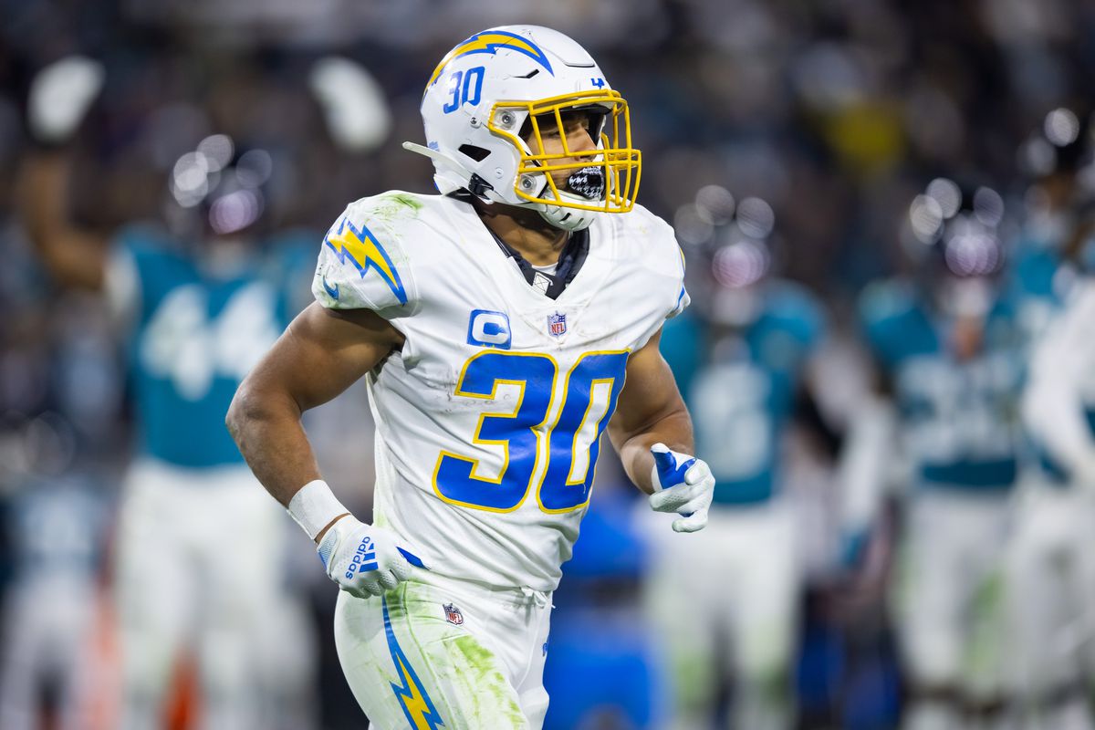 Los Angeles Chargers running back Austin Ekeler (30) against the Jacksonville Jaguars during a wild card playoff game at TIAA Bank Field.