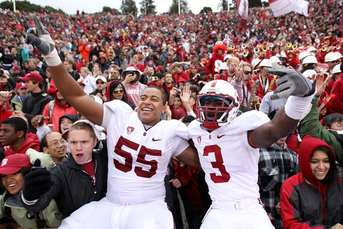Michael Thomas #3 and Jonathan Martin #55 of the Stanford Cardinal celebrate after beating the California Golden Bears.
