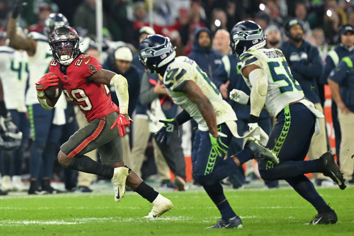 Rachaad White #29 of the Tampa Bay Buccaneers runs with the ball in the fourth quarter during the NFL match between Seattle Seahawks&nbsp;and Tampa Bay Buccaneers at Allianz Arena on November 13, 2022 in Munich, Germany.