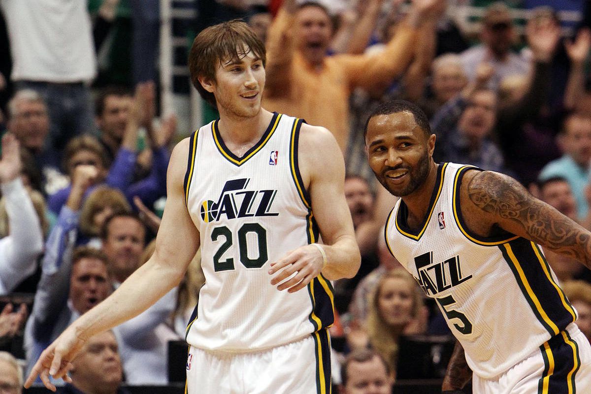 Gordon Hayward of the Utah Jazz celebrates after banking in a shot at the end of the first quarter during NBA basketball in Salt Lake City, Friday, April 12, 2013. At right is Mo Williams of the Utah Jazz.