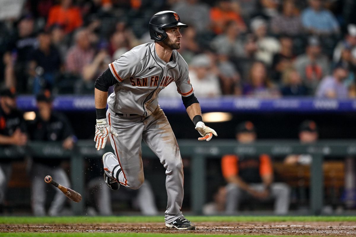 Steven Duggar #6 of the San Francisco Giants follows through after hitting a fourth inning double against the Colorado Rockies at Coors Field on September 7, 2021 in Denver, Colorado.