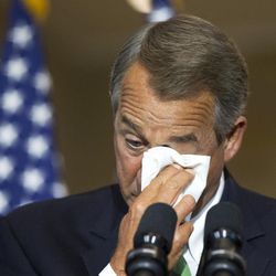 House Speaker John Boehner of Ohio, wipes away his tears, as he delivers his remarks during a ceremony honoring the members of the First Special Service Force whose fearlessness and bravery contributed to the liberation of Europe and end to World War II, with a Congressional Gold Medal on Capitol in Washington Tuesday, Feb. 3, 2015.  