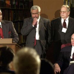 William Alex Haley, from left, Darius Gray, Bruce Olsen and Elder Dallin H. Oaks at a press conference to announce the release of Freedman's Bank CD, a database of several generations of post-Civil War African-Americans in 2001.