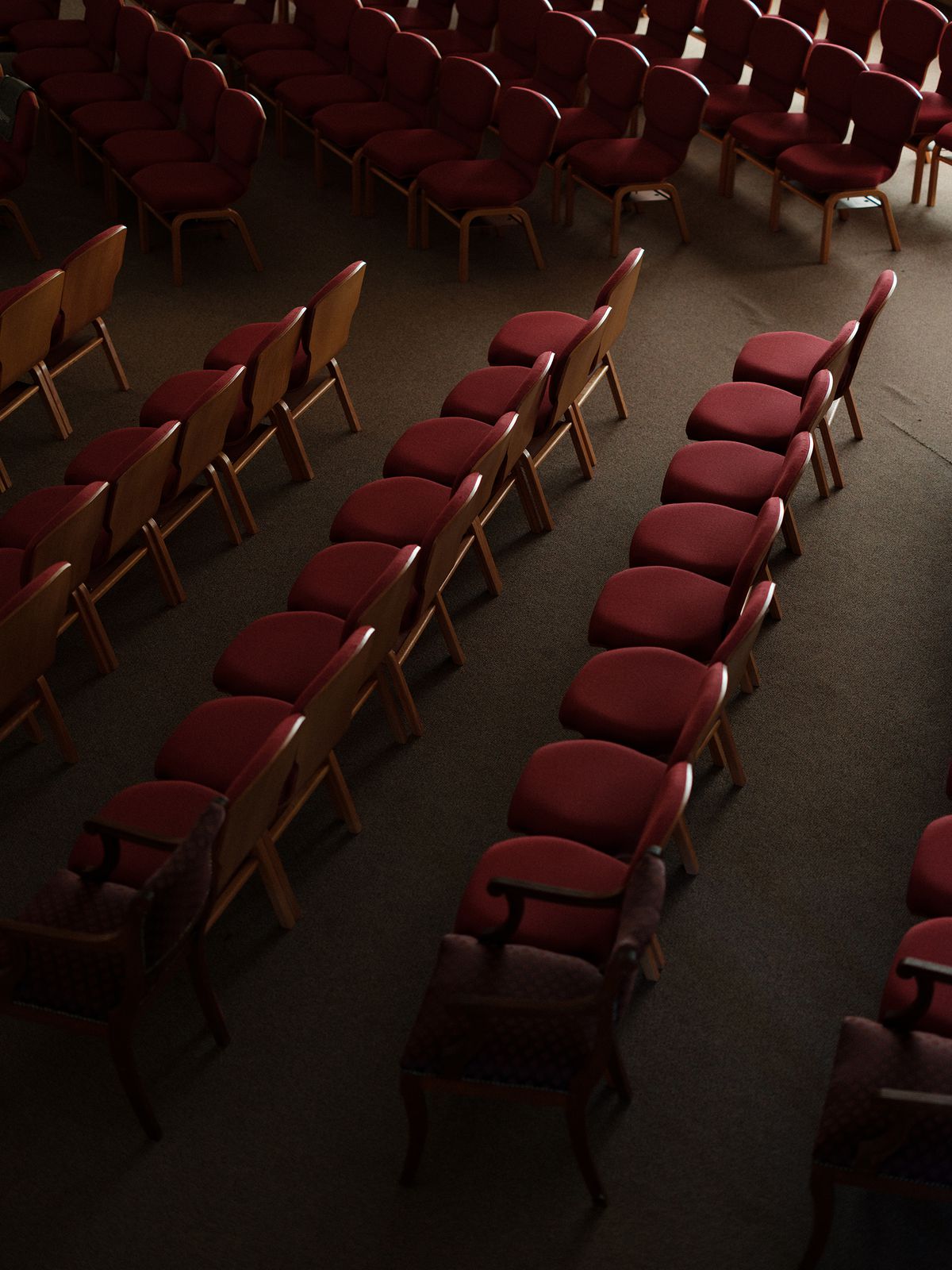 Rows of red chairs in the sanctuary at the Macedonia Baptist Church. 
