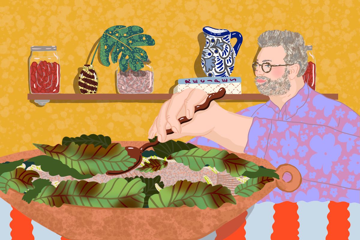 Steve Sando spoons some fig leaves from a Moroccan tagra filled with fish. Illustration.